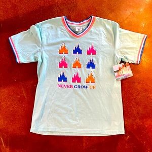 Jayelynn Brooke  Disney “Never Grow Up” Castle shirt. Super cute! I have 2!